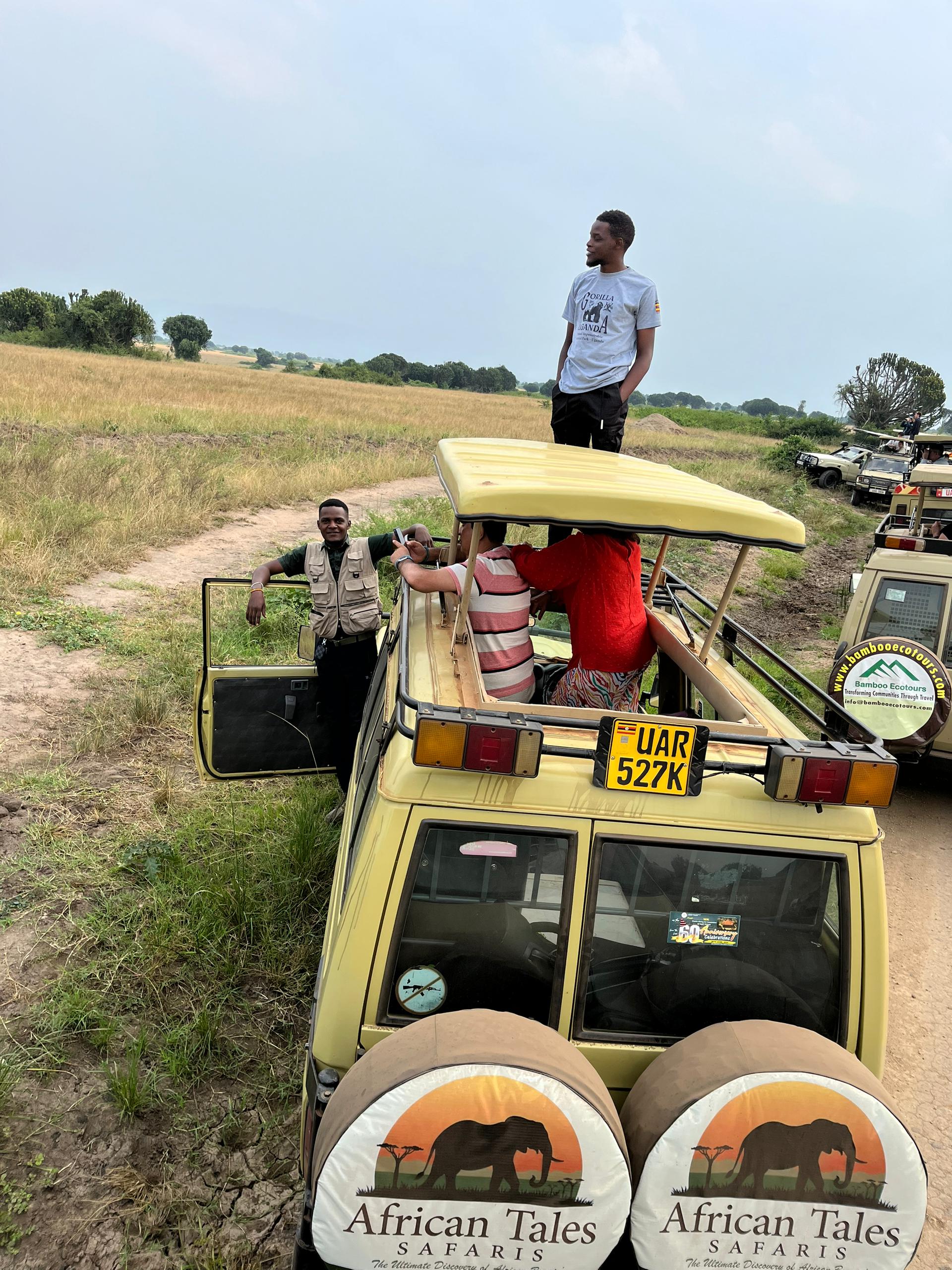 African Tales Safaris professional vehicle with guides and tourists in the savanna